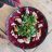 Carpaccio van rode biet met sinaasappeldressing, rucola & geitenkaas